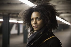 Woman with natural type 4B curly hair
